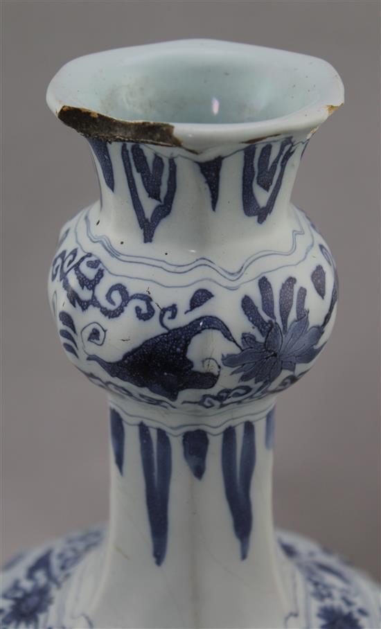A Delft blue and white bottle vase, c.1700, 32.5cm, drilled and chipped